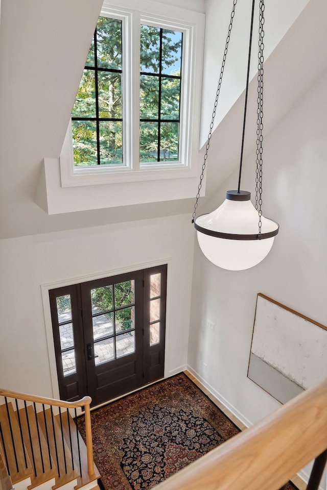 entrance foyer with a towering ceiling