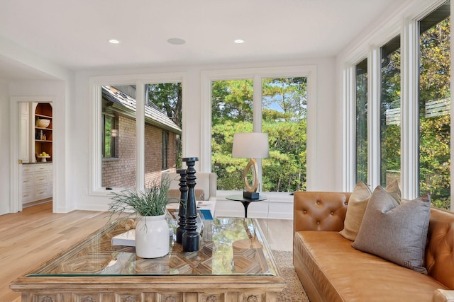 sunroom / solarium featuring a wealth of natural light