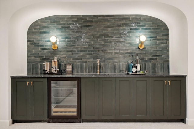 bar with sink and beverage cooler