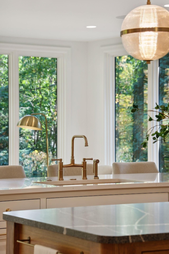 interior details with a chandelier and a sink