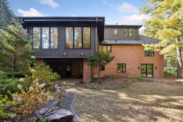 back of property with brick siding