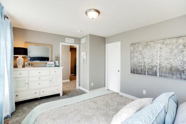 bedroom with carpet, baseboards, and visible vents