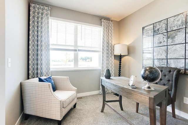 carpeted home office with visible vents and baseboards