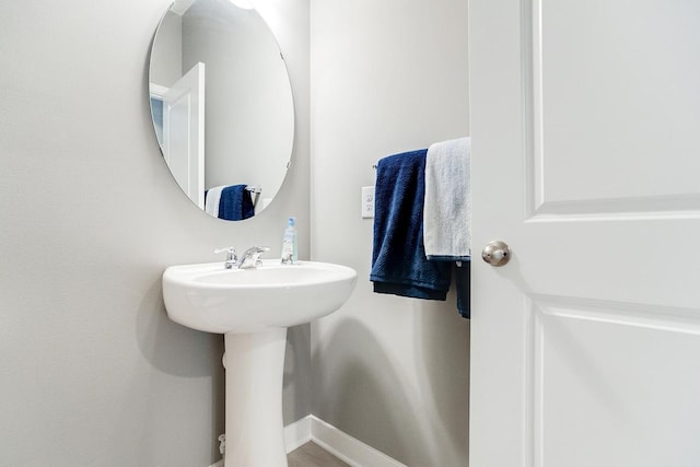 bathroom featuring baseboards