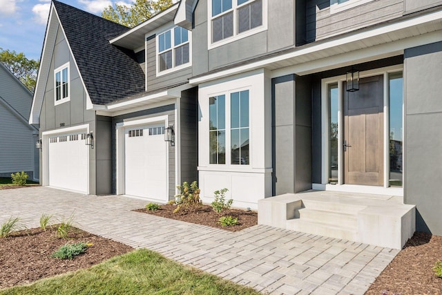 property entrance with a garage