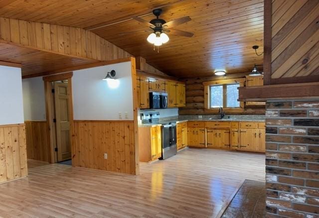 kitchen with decorative light fixtures, vaulted ceiling, stainless steel range with electric cooktop, and wood ceiling