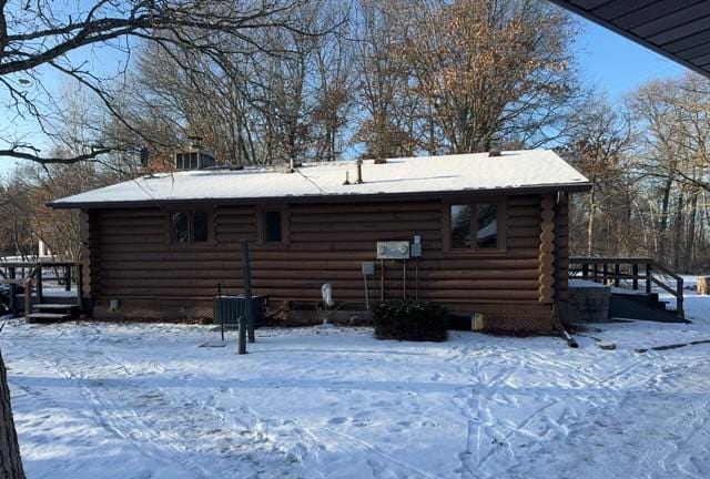 view of snow covered house