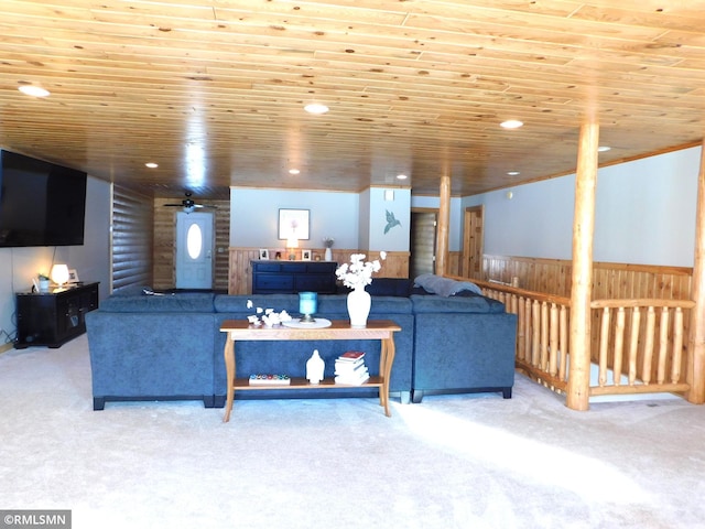 carpeted living room featuring wooden ceiling