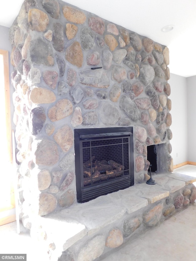 interior details featuring a fireplace