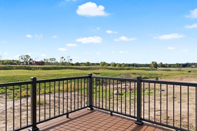 balcony featuring a rural view