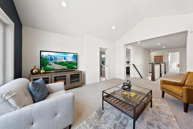 living area with vaulted ceiling, recessed lighting, baseboards, and light colored carpet