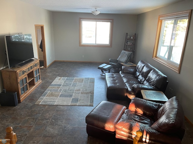 living room featuring a textured ceiling