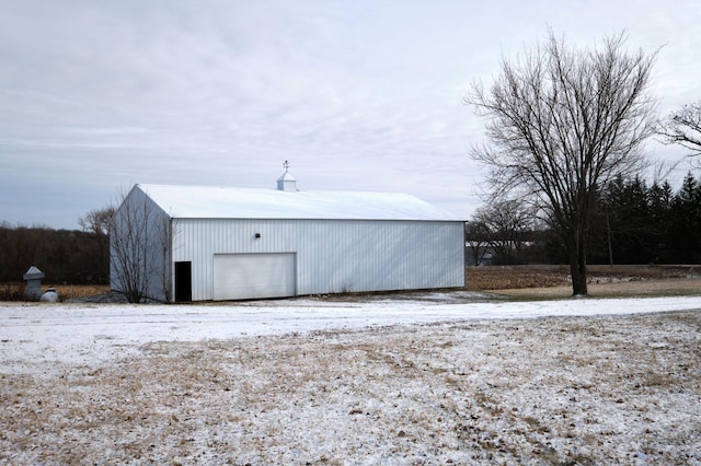 view of outdoor structure with a garage