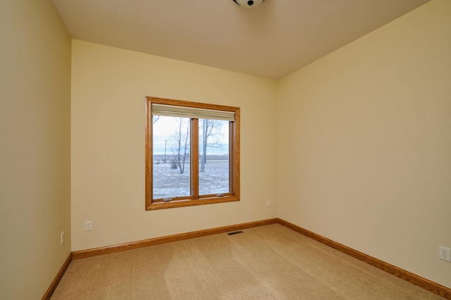 empty room featuring carpet flooring