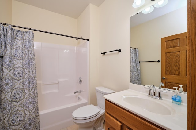 full bathroom with shower / bath combo, vanity, and toilet