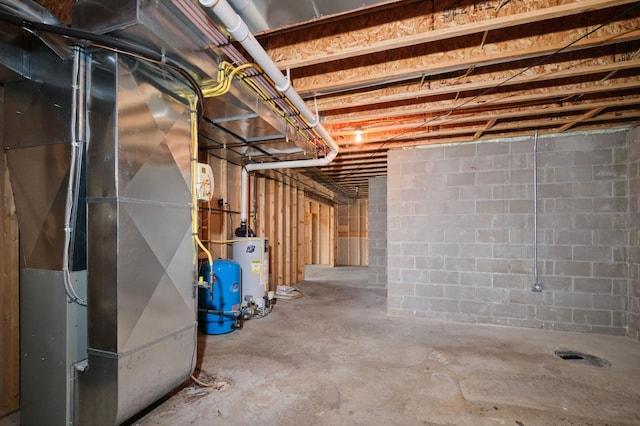 basement with heating unit and water heater