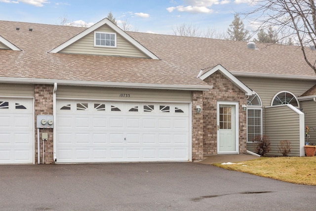 single story home with a garage