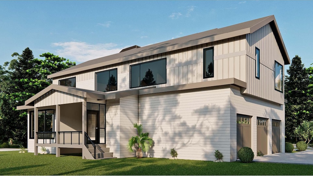 view of front of home featuring a garage and a front lawn