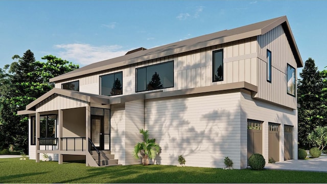 view of front of home featuring a garage and a front lawn