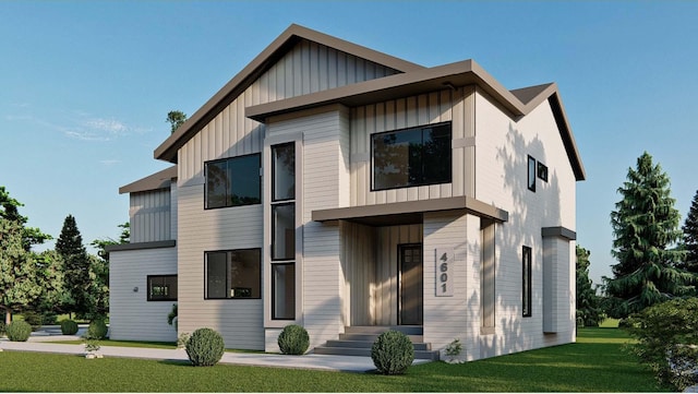 view of front of house with a front yard and board and batten siding