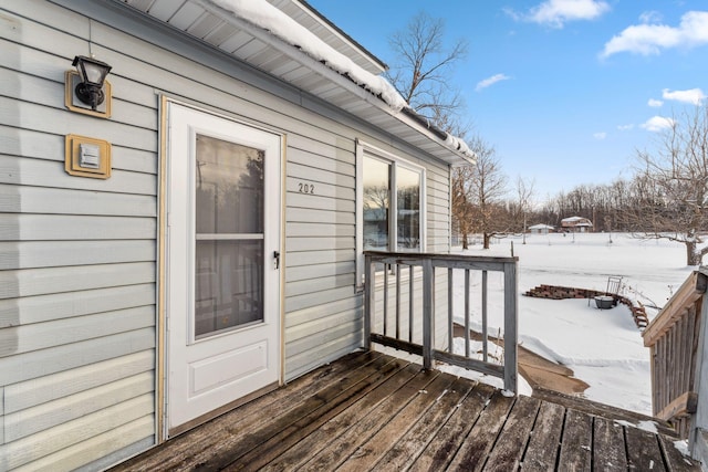 view of snow covered deck