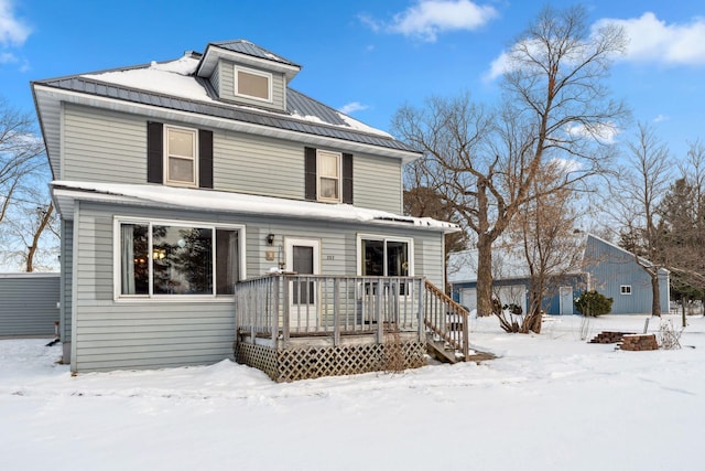 front of property with a deck