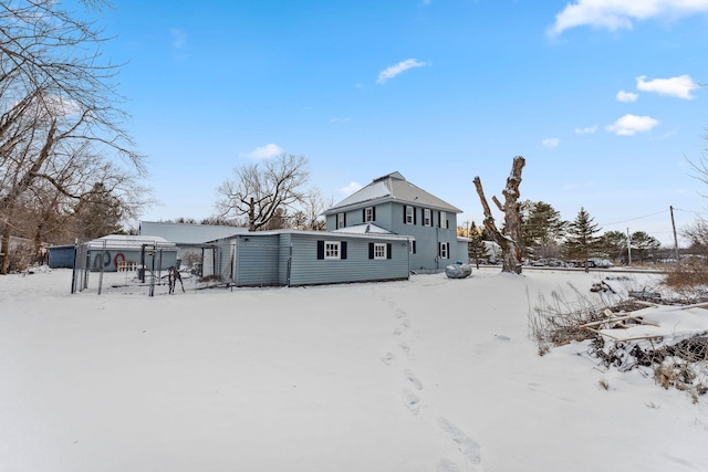 view of snow covered property