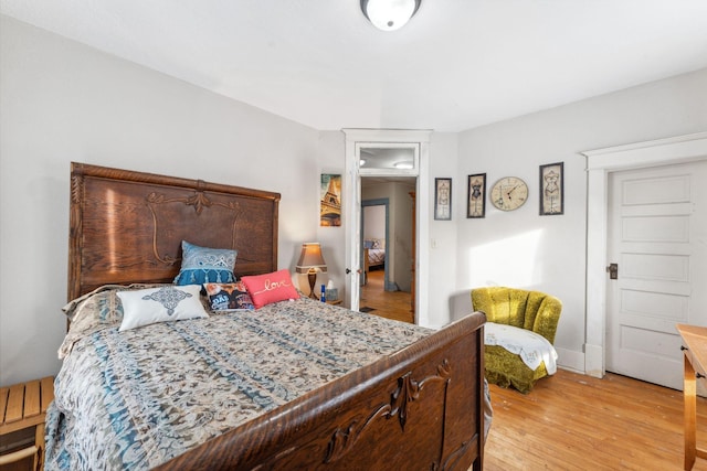 bedroom featuring light wood-type flooring