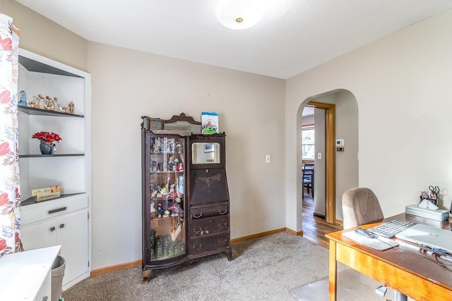 office area with light colored carpet