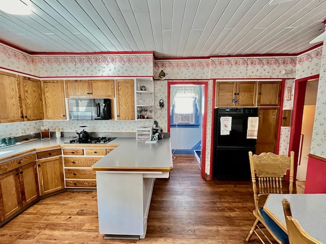 kitchen featuring light hardwood / wood-style floors, wooden ceiling, and black appliances