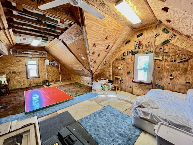 bedroom featuring ceiling fan and lofted ceiling