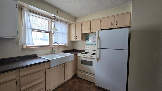 kitchen with pendant lighting, white appliances, sink, a textured ceiling, and cream cabinetry