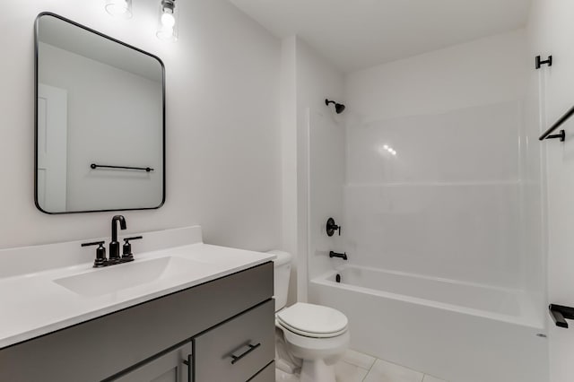 full bath featuring toilet, tile patterned flooring, shower / washtub combination, and vanity