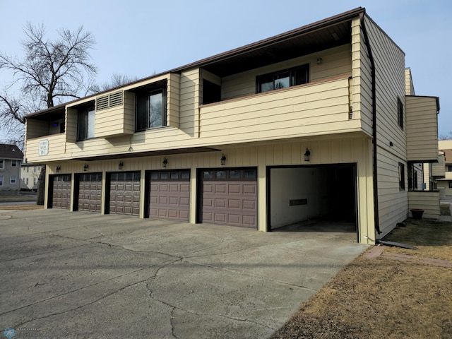 exterior space with a garage and driveway