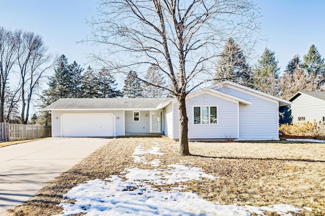 single story home featuring a garage