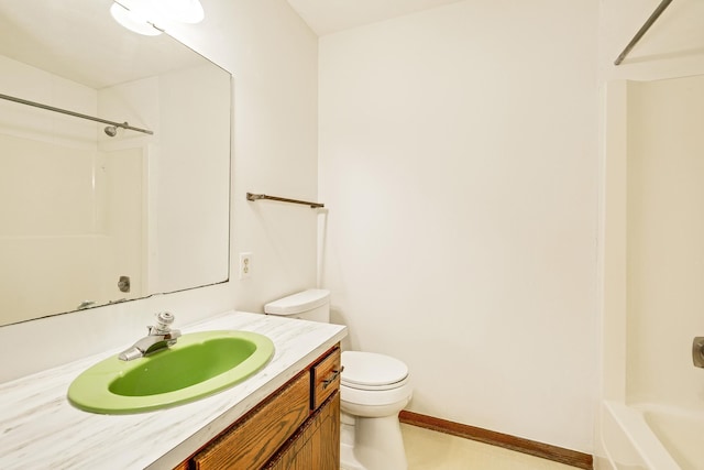 full bathroom with vanity, shower / tub combination, and toilet