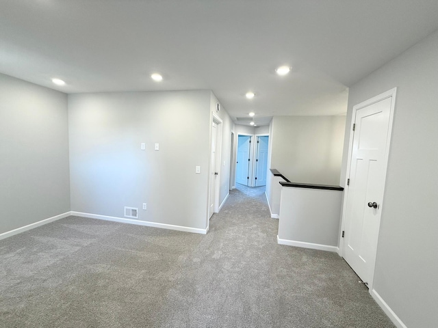 unfurnished room with carpet flooring