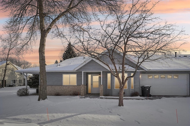 view of front of property with a garage