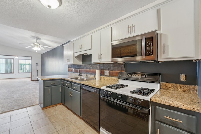 kitchen featuring white gas stove, gray cabinetry, white cabinets, black dishwasher, and sink