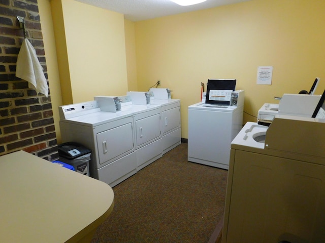 laundry room with washing machine and dryer