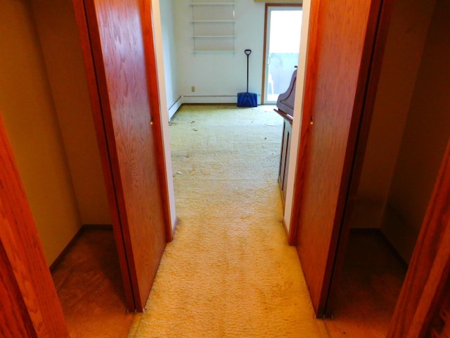 hall with light colored carpet