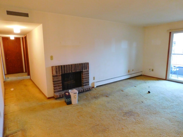 unfurnished living room with light carpet, a fireplace, and a baseboard heating unit