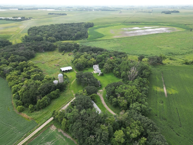 birds eye view of property with a rural view