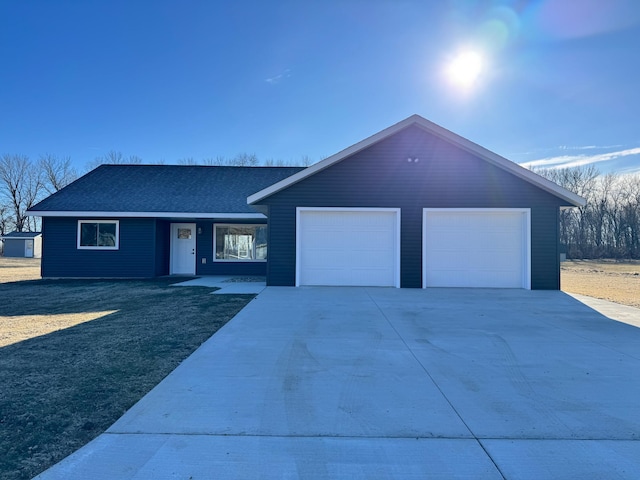 single story home featuring a garage