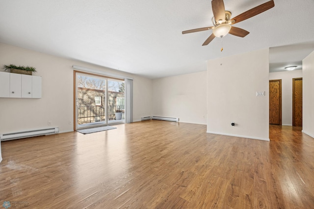 unfurnished living room with light hardwood / wood-style flooring, baseboard heating, and ceiling fan