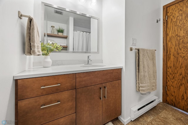 bathroom featuring vanity, a baseboard radiator, and a shower with shower curtain