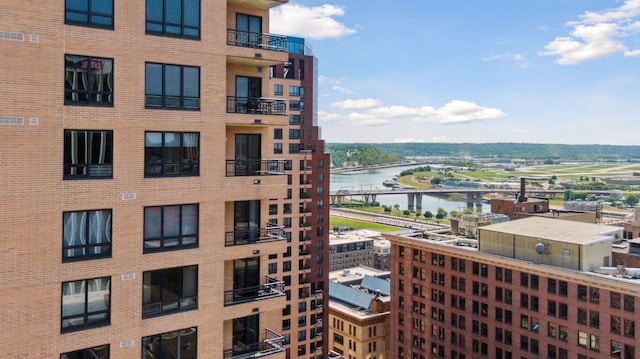 view of property with a water view