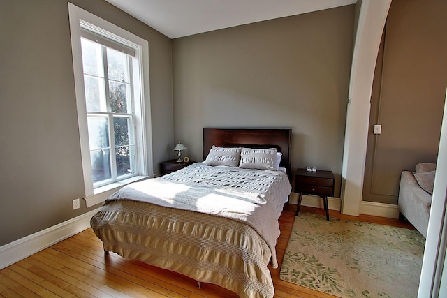 bedroom featuring wood-type flooring