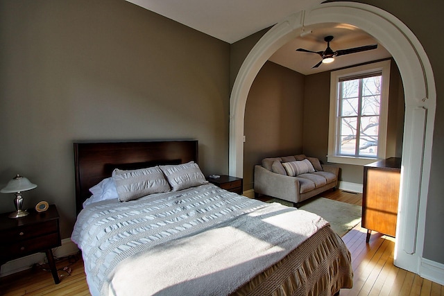 bedroom featuring ceiling fan and light wood-type flooring