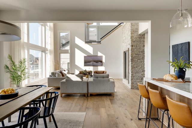 living room featuring plenty of natural light and light wood-type flooring